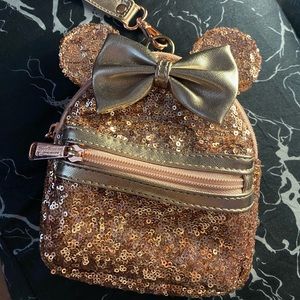 loungefly minnie mouse rose gold wristlet. used once. also has belt loop